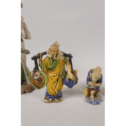 250 - Eight oriental ceramic figures of bearded sages, largest 20cm high, AF