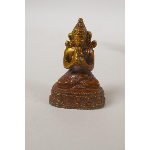 253 - Two Tibetan bronze figures of Buddha and Tara, and an Indian bronze figure of Ganesh, largest 9cm hi... 