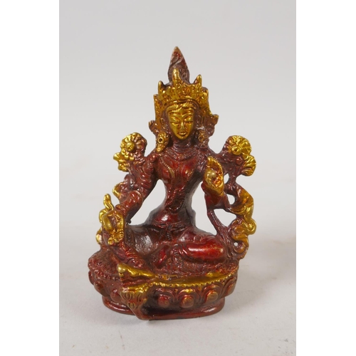 253 - Two Tibetan bronze figures of Buddha and Tara, and an Indian bronze figure of Ganesh, largest 9cm hi... 