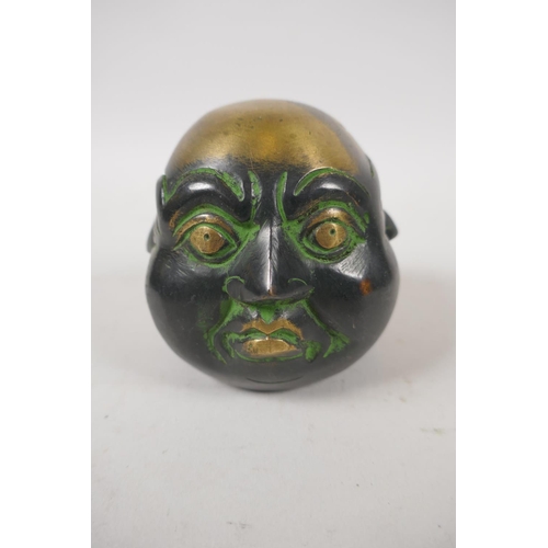 259 - A Chinese bronze four face Buddha head, 8cm