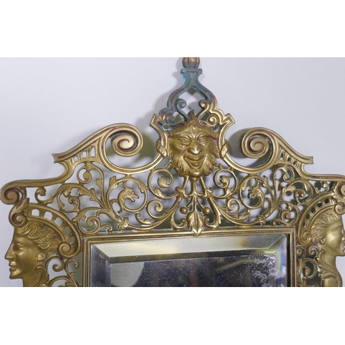 3 - A pair of Victorian pierced brass girondelle wall mirrors, with three sconces, 30 x 50cm