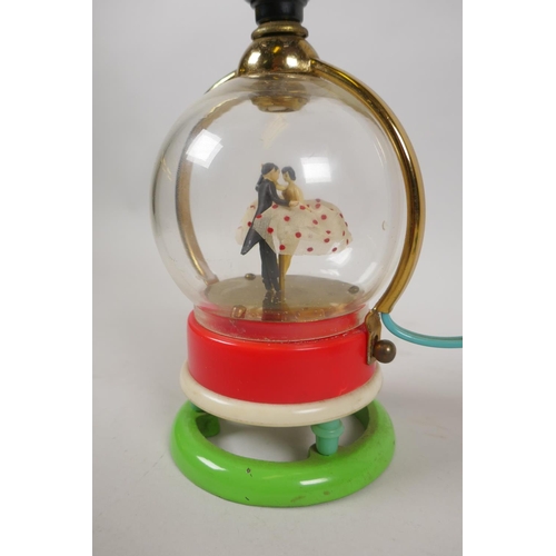 30 - A Japanese kitsch musical lamp base with a ballroom dancing couple, 21cm high