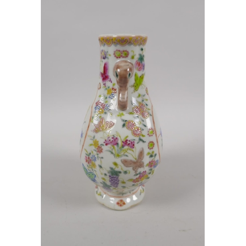 43 - A late C19th/early C20th Chinese famille verte vase with two elephant mask handles and floral decora... 