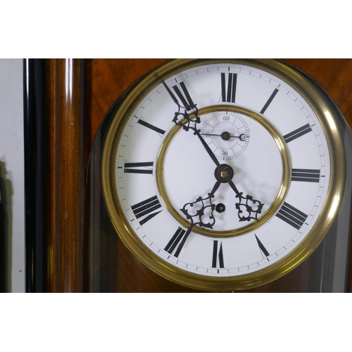 607 - A late C19th Vienna wall clock with walnut and ebonised case and brass and enamel dial with Roman nu... 