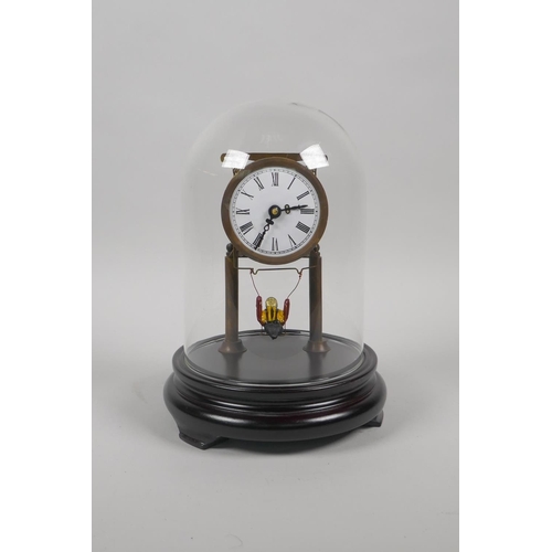 609 - A glass domed skeleton clock, the pendulum in the form of a child on a swing, 21cm high