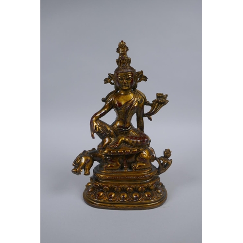 61 - A Sino Tibetan gilt metal figure of Tara, 21cm high