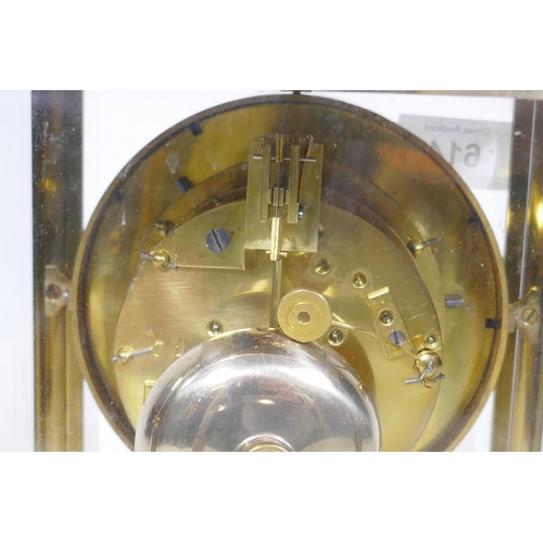 614 - A French four glass  mantel clock with open Brocot escapement on an engine turned dial, with en... 