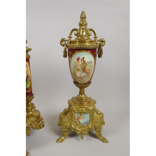 624 - A Sevres style ormolu and porcelain German clock garniture by Franz Hermle, 1991, the movement strik... 