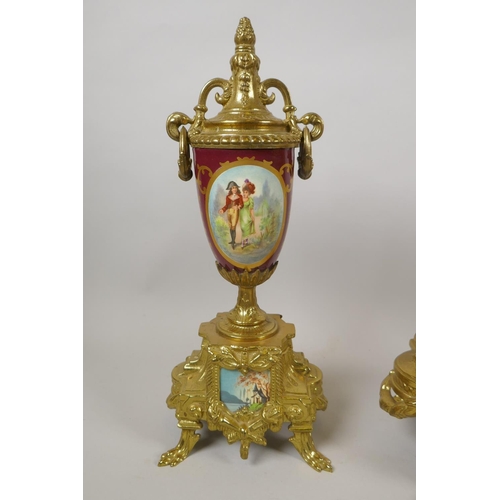 624 - A Sevres style ormolu and porcelain German clock garniture by Franz Hermle, 1991, the movement strik... 