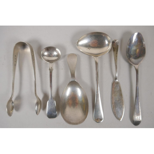 635 - A collection of hallmarked silver tea spoons, tea scoop, sugar tongs etc, and a quantity of silver p... 