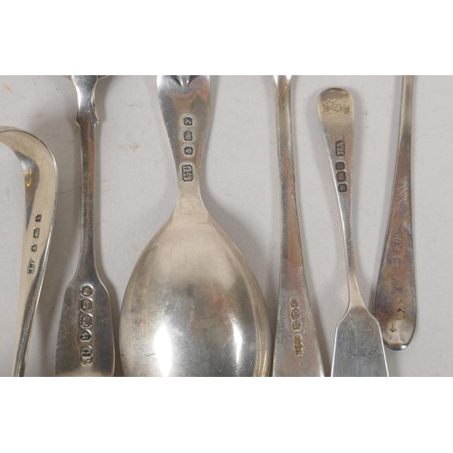 635 - A collection of hallmarked silver tea spoons, tea scoop, sugar tongs etc, and a quantity of silver p... 