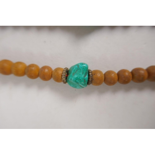 648 - Six assorted strings of Tibetan mala beads in bone, glass, hardstone, etc