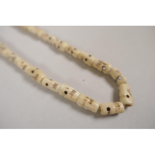 648 - Six assorted strings of Tibetan mala beads in bone, glass, hardstone, etc