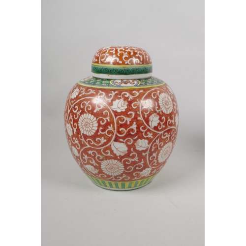 65 - An early C20th Chinese polychrome porcelain ginger jar, a crackleware ginger jar and a smaller famil... 