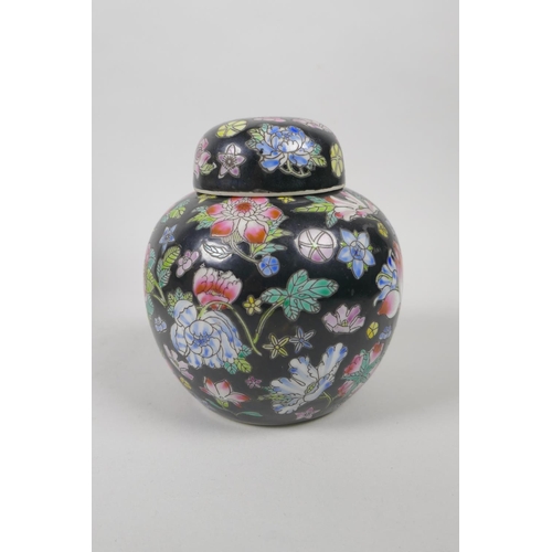 65 - An early C20th Chinese polychrome porcelain ginger jar, a crackleware ginger jar and a smaller famil... 