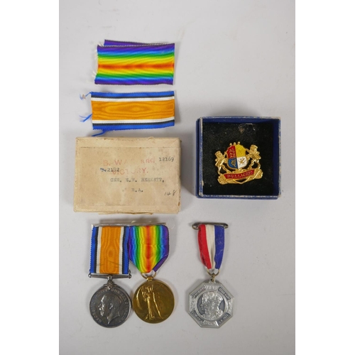 70 - A WWI Victory and War Medal awarded to Gunner E.M. Bennett of the Royal Field Artillery, 2182; a 193... 