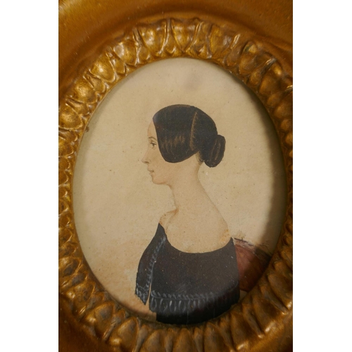 803 - A C19th gilt framed miniature portrait of a young lady, and a C19th silhouette portrait of a gentlem... 