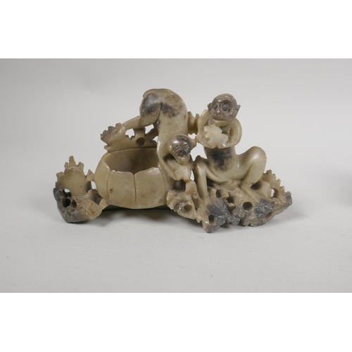 93 - Three Chinese soapstone carvings with flowers and animals, and four smaller soapstone monkeys, large... 