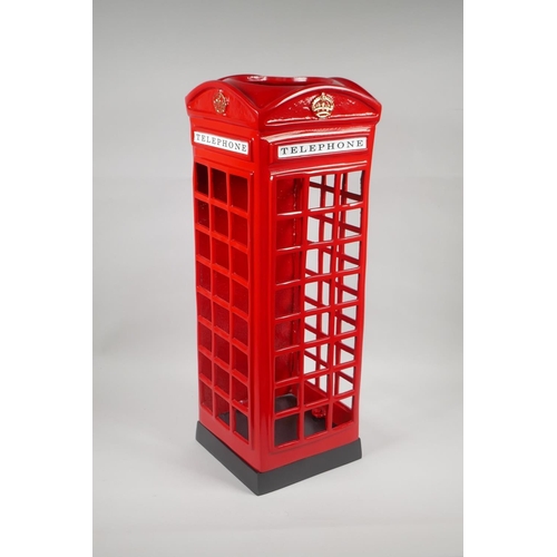 99 - A painted cast metal umbrella stand in the form of a telephone box, 57cm high