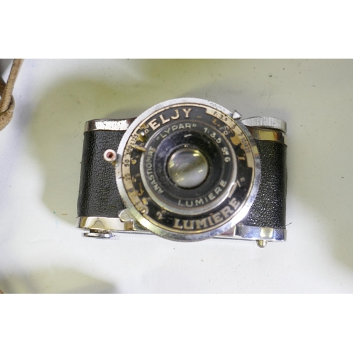 116 - Vintage cameras, Eljy Lumiere with Lypar 3.5 Sie G lens and leather case; Wembley Sports, 1:11 f/8.5... 