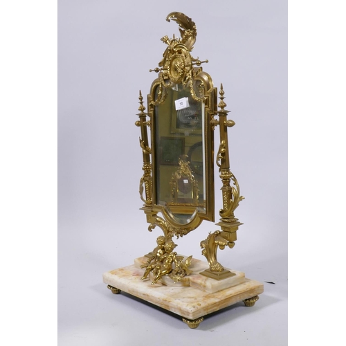 10 - A C19th French onyx and ormolu swing table mirror, decorated with cupids and classical details, with... 