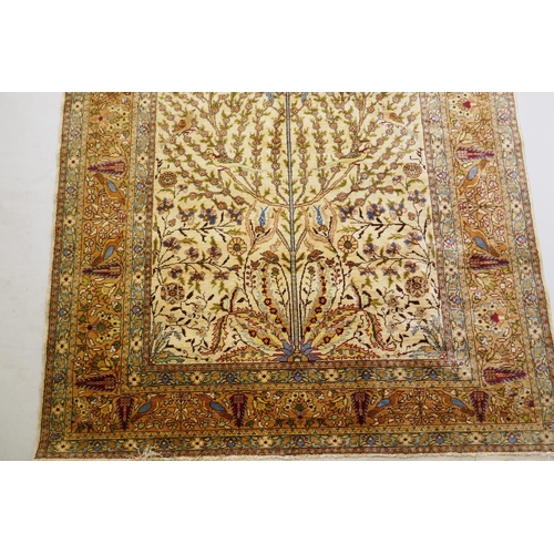 1083 - A Turkish Hereke silk carpet/wall hanging with tree of life design on a gold field, 155 x 165cm