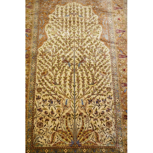 1083 - A Turkish Hereke silk carpet/wall hanging with tree of life design on a gold field, 155 x 165cm