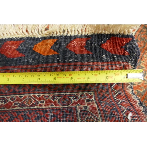 1098 - A hand woven wool Bokhara runner, 385 x 89cm