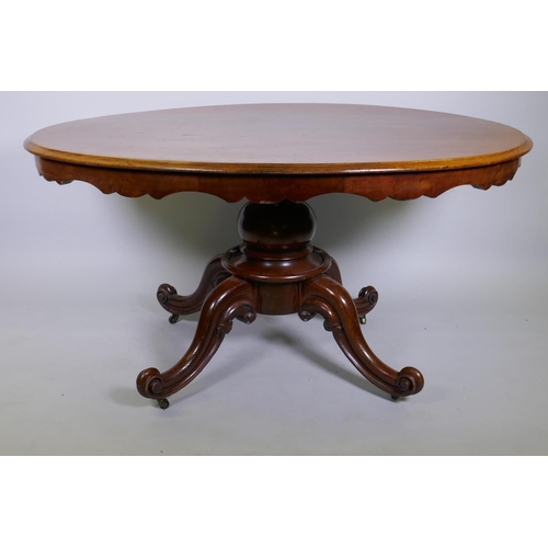 1118 - A good Victorian mahogany tilt top and swivel breakfast table, with shaped frieze raised on a turned... 