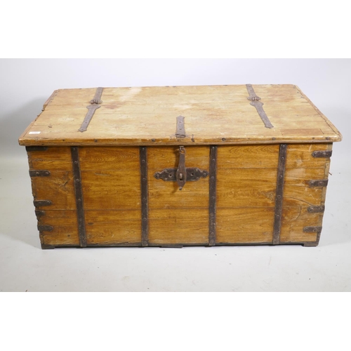 1152 - An antique Eastern teak chest with iron mounts and lift up top, 110 x 64 x 47cm