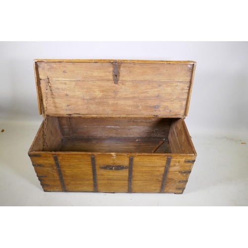 1152 - An antique Eastern teak chest with iron mounts and lift up top, 110 x 64 x 47cm