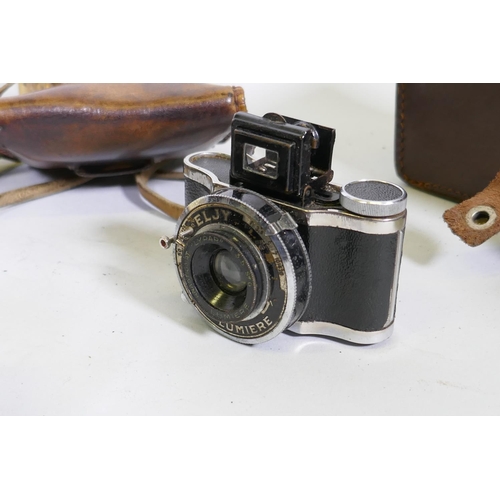 116 - Vintage cameras, Eljy Lumiere with Lypar 3.5 Sie G lens and leather case; Wembley Sports, 1:11 f/8.5... 