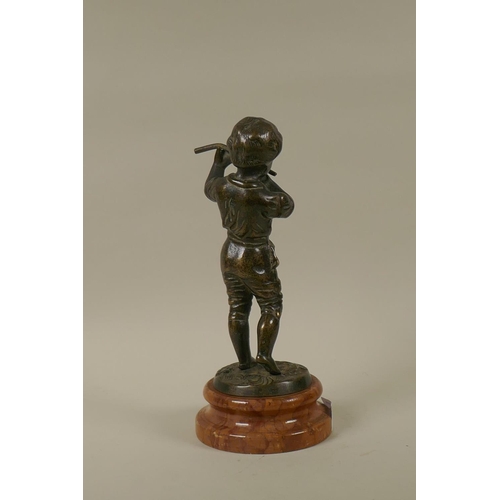 19 - An antique solid cast bronze figure of a boy with a flute mounted on a marble base, 28cm high