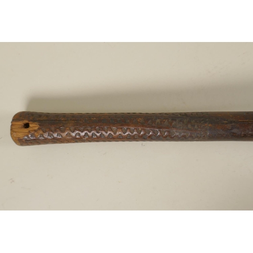 24 - A C19th Fijian carved wood throwing club (I Ula Tavatava) with fluted head and incised pattern to th... 