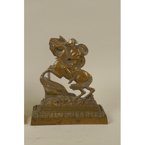 36 - An antique gilt brass doorstop in the form of the Duke of Wellington on horseback, 26cm high, and an... 