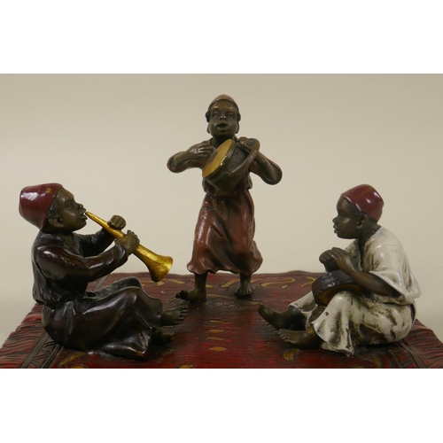 52 - A Bergman style cold painted bronze figure group of three musicians, impressed mark to base, 16 x 17... 