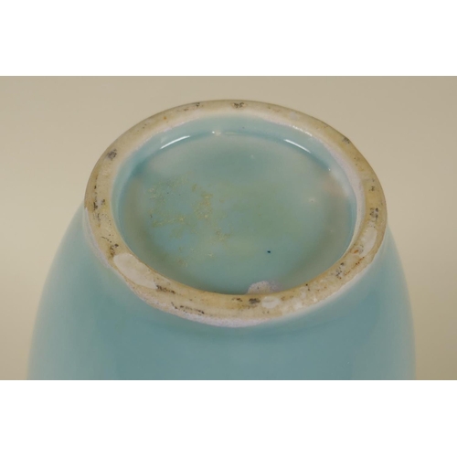 56 - A Chinese celadon glazed ceramic vase, 26cm high