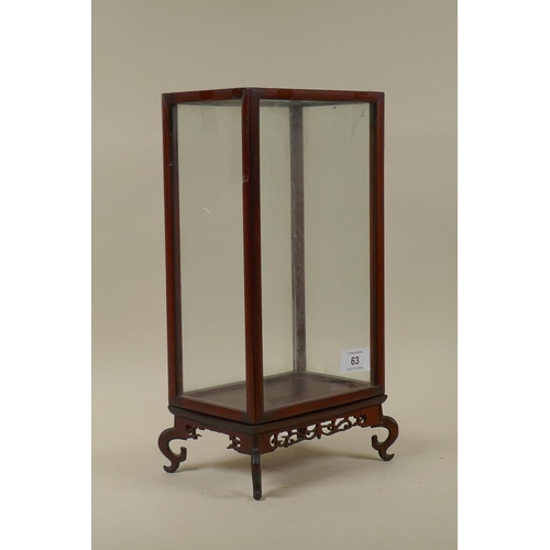 63 - A Chinese table display cabinet raised on a pierced wood base, 18 x 13 x 34cm