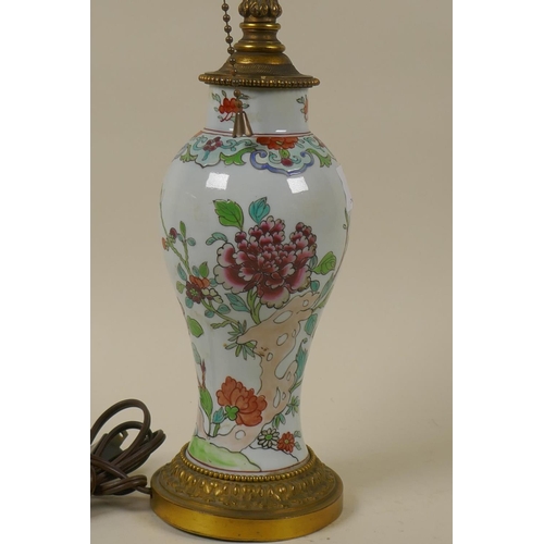 65 - Oriental style ceramic vase with enamelled floral decoration and ormolu mounts, 44cm high