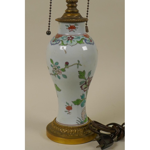 65 - Oriental style ceramic vase with enamelled floral decoration and ormolu mounts, 44cm high