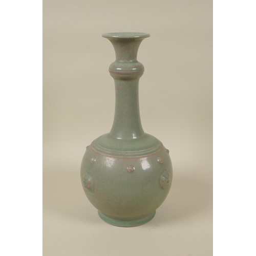 75 - A Chinese ru ware style celadon crackle glazed porcelain vase with mask decoration, 29cm high