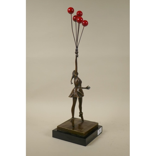 78 - After Banksy, a bronze figure of a girl with red balloons, inscribed Banksy, mounted on a marble bas... 