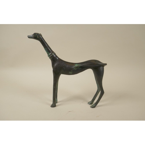 79 - A stylised filled bronze greyhound, 22cm high