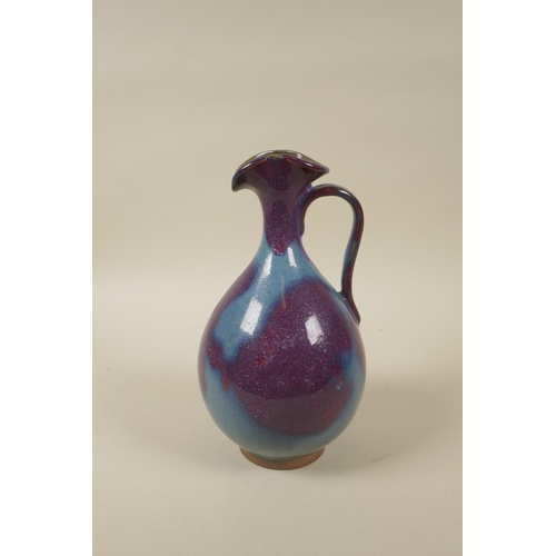 88 - A Chinese Jun ware pottery jug, 22cm high