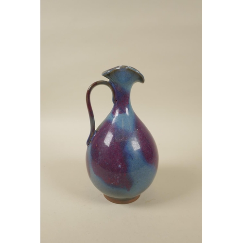 88 - A Chinese Jun ware pottery jug, 22cm high