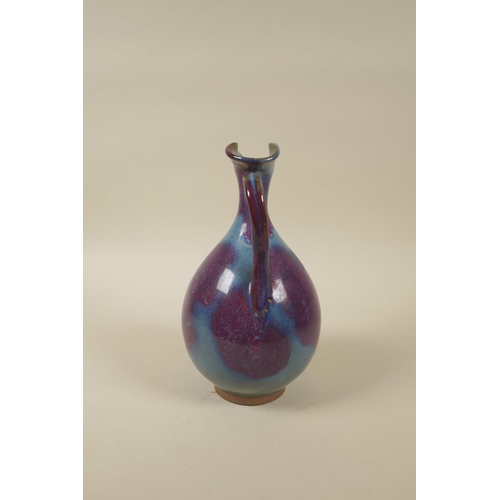 88 - A Chinese Jun ware pottery jug, 22cm high