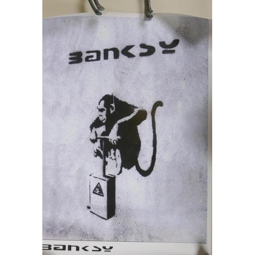 910 - A set of eight Banksy Save or Delete stickers and two posters after the artist, and a Damned music p... 