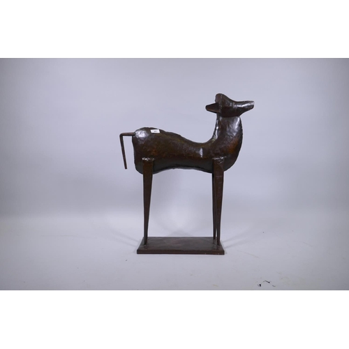 93 - A patinated metal figure of a standing deer, 74cm high