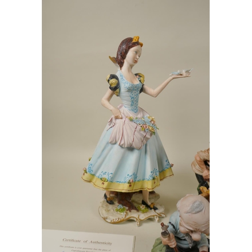 98 - A set of eight Capodimonte porcelain figures of Snow White and the Seven Dwarfs, 30cm high, some wit... 