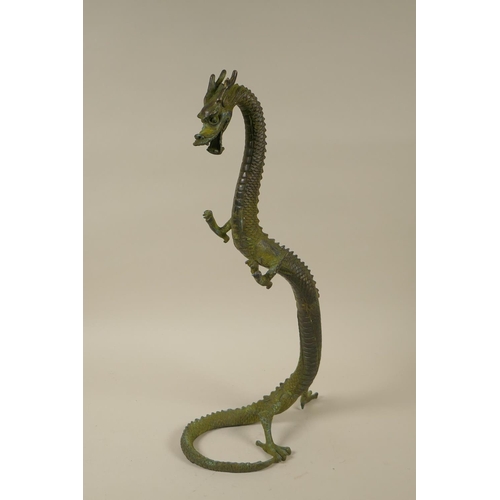 99 - A Chinese bronze figure of a rearing dragon with verdigris patina, 39cm high